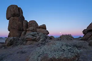 Rock Prints: Red granite rock formations in the Margaz Mountains at sunrise