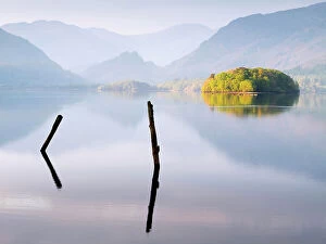 Reflections in Derwent Water in morning light. Keswick, The Lake District, Cumbria
