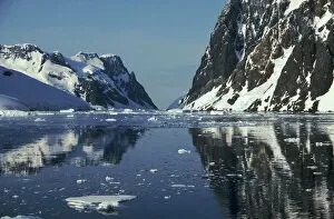 Images Dated 2nd April 2003: Reflections in Lemaire Channel with brash ice, Antarctica