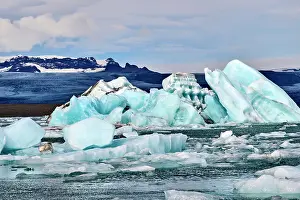 Iceberg Prints: RF - Icebergs in glacial lagoon with glacier in background