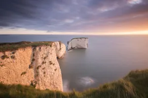 Limestone Prints: RF - Old Harry Rocks, colourful sunrise looking towards the Isle of Wight