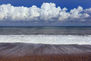RF- Waves of the North Sea washing onto Weybourne beach, Norfolk, UK. August 2014
