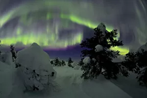 Riisitunturi in winter with Aurora Borealis, Kuusamo, Lapland, Finland. February