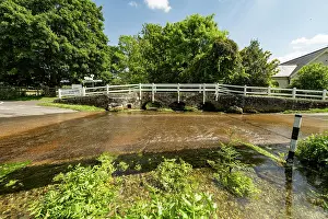 River Tarrant chalk stream, ford and packhorse bridge, Tarrant Launceston, Dorset, England, UK. June, 2024