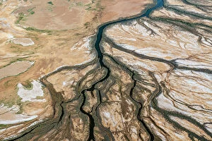 Rivers/water channels  form and water flows into Lake Eyrer North as a result of uncommonly high desert rainfall