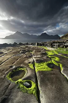 2019 August Highlights Gallery: Rocky shoreline, Loch Scavaig and view to Cuillin mountians, Isle of Skye, Scotland, UK, April