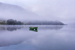 Images Dated 20th January 2017: Rowing boat on Ullswater in early morning mist, Lake District, Cumbria, England, UK. November 2015