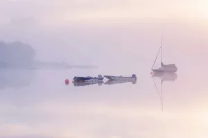 Somerset Prints: Sailing boat reflected in the mist at sunrise at Wimbleball Reservoir
