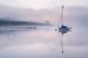 Somerset Prints: Sailing boat reflected in Wimbleball Lake in morning mist