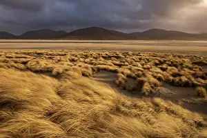 Hebrides Prints: Sand dunes and beach under stormy sky
