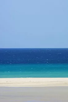 Images Dated 14th April 2013: Sandy beach and bright blue ocean, Fuerteventura, Canary Islands. April 2013