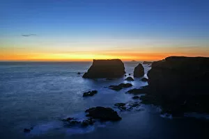 Coast Gallery: Sea stacks and cliffs at sunset at Eshaness / Esha Ness, peninsula in Northmavine