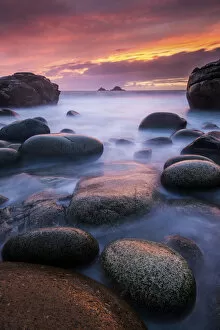 Images Dated 10th September 2012: Sea and stones at Porth Nanven beach, with rising tide at sunset, The Cot Valley
