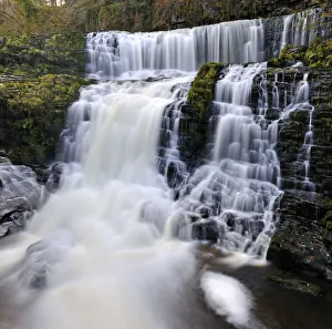Waterfalls Collection: Sgwd Isaf Clun-gwyn waterfall. Ystradfellte, Brecon Beacons National Park, Wales, November 2011