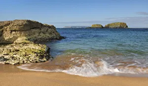 Sheep island viewed from Boheeshane Bay, Ballintoy, North Antrim coast, County Antrim