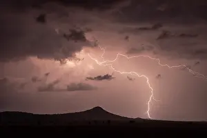 Dramatic Prints: Sheet lightning over Mount Kamunya at night