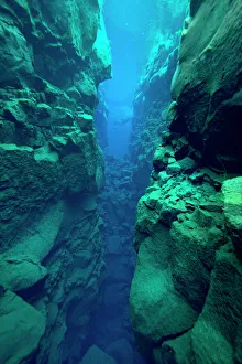 Nordic Countries Prints: Silfra Canyon - deep fault filled with fresh water in the rift valley between the Eurasian