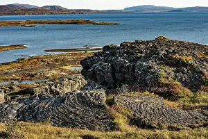 Volcano Prints: Silfra, a rift valley formed in the Mid-Atlantic Ridge and Thingvellir Lake with ropey lava in the foreground