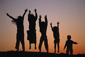 Images Dated 5th July 2005: Silhouette of five leaping Children, Bohuslan archipelago, Sweden
