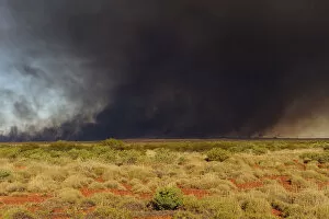 Australia Collection: Smoke from bush fire in Pilbara region, Western Australia. August 2009