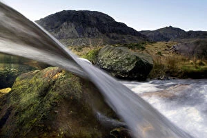 Images Dated 9th July 2008: A split-level view through a small waterfall, Llanberis, Snowdonia NP, Gwynedd, Wales
