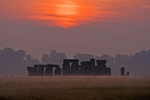 Stonehenge at sunrise on the 21st September, the autumn equinox, Wiltshire, UK
