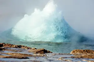 Steam Prints: Strokkur Geyser erupting. Air bubbles bloat the expanding top of the Geyser just before it erupts