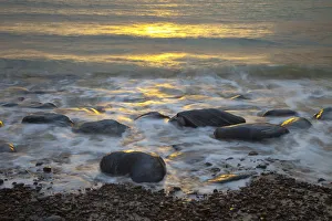 Images Dated 3rd June 2009: Sun reflecting on sea surface with rocks on beach, Dail Beag Beach, Lewis, Outer Hebrides