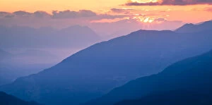 Images Dated 5th July 2011: Sun rising over mountain landscape at dawn. Nordtirol, Tirol, Austrian Alps, Austria