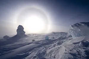 Sundog / Parhelion (circle of light around the sun) with large ice fumerole in the foreground