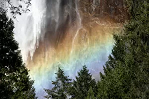Waterfalls Collection: Sunlight creating a rainbow in the spray of the Bridalveil Falls, Yosemite National Park