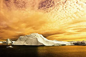 Global Warming Prints: Sunset over iceberg. Jakobshavn, Ilulissat, Kangia, Icefjord, Greenland. August 2006