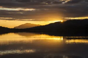 Sunset over Loch Insh, Cairngorms National Park, Scotland, UK. October, 2013 Sunset over Loch Insh, Cairngorms National Park, Scotland, UK. October, 2013