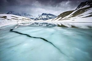 Cool Coloured Landscapes Collection: Thawing alpine lake, Vanoise National Park, Rhone-Alpes, France, June