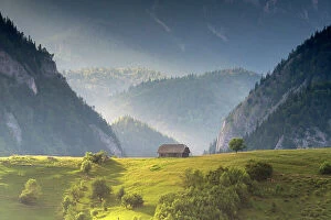 Green Mountains Collection: Traditional barn on hilltop in mountain landscape, Magura, Brasov County, Carpathian mountains