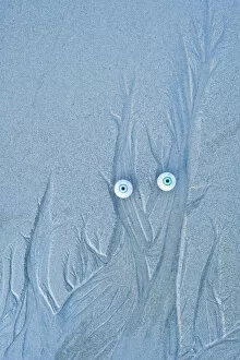 Troll face on a sandy beach, Islay, Scotland