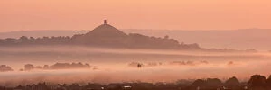 Images Dated 16th January 2014: View towards Glastonbury Tor with low lying mist at sunrise from Waltons Hill, Glastonbury