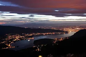 France Prints: View of Lake Annecy from the Tournette mountains at night