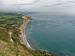 Dramatic Prints: View long coast to Seatown and beach, Golden Cap, Dorset, England, UK. October, 2023