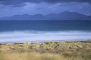 Ammophila Prints: View across Sound of Taransay to North Harris hills in stormy weather