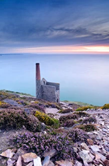 View of Towanroath Engine House and out over the sea in the late evening light. Wheal Coates