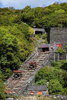 Metamorphic Rock Prints: Wagons on a tramway powered by gravity at Vivian Quarry
