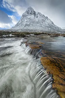 Waterfall with Buachaille Etive Mor in background, Glen Coe, Highlands, Scotland, UK Waterfall with Buachaille Etive Mor in background, Glen Coe, Highlands, Scotland, UK