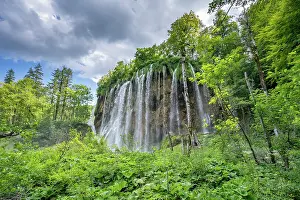 Waterfall Prints: Waterfall surrounded by forest, Plitvice Lakes National Park, Croatia. August, 2023