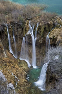 Waterfalls cascading between mountain lakes, Plitvice Lakes National Park, Croatia
