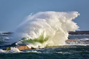 Bretagne Prints: Waves crashing over breakwater during a storm