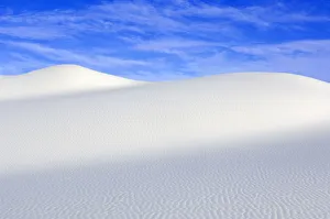 White sand dunes against blue sky, White Sands National Monument, New Mexico, USA