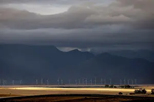 Equipment Prints: Wind turbines under a stormy sky on a farm near the town of Hermon