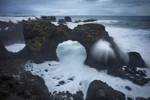 Winter storm on the coast near Arnastapi (rock arch of Gatklettur), Snaefellsness Peninsula
